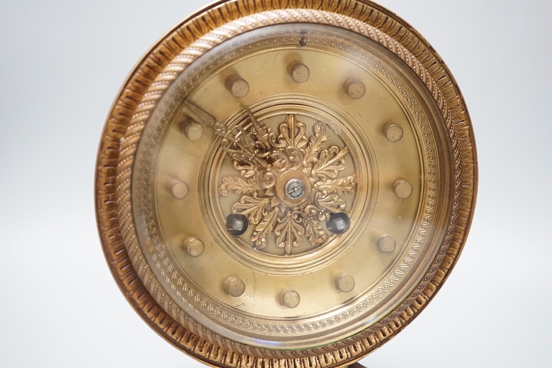 An early 20th century Empire style brass clock 32cm